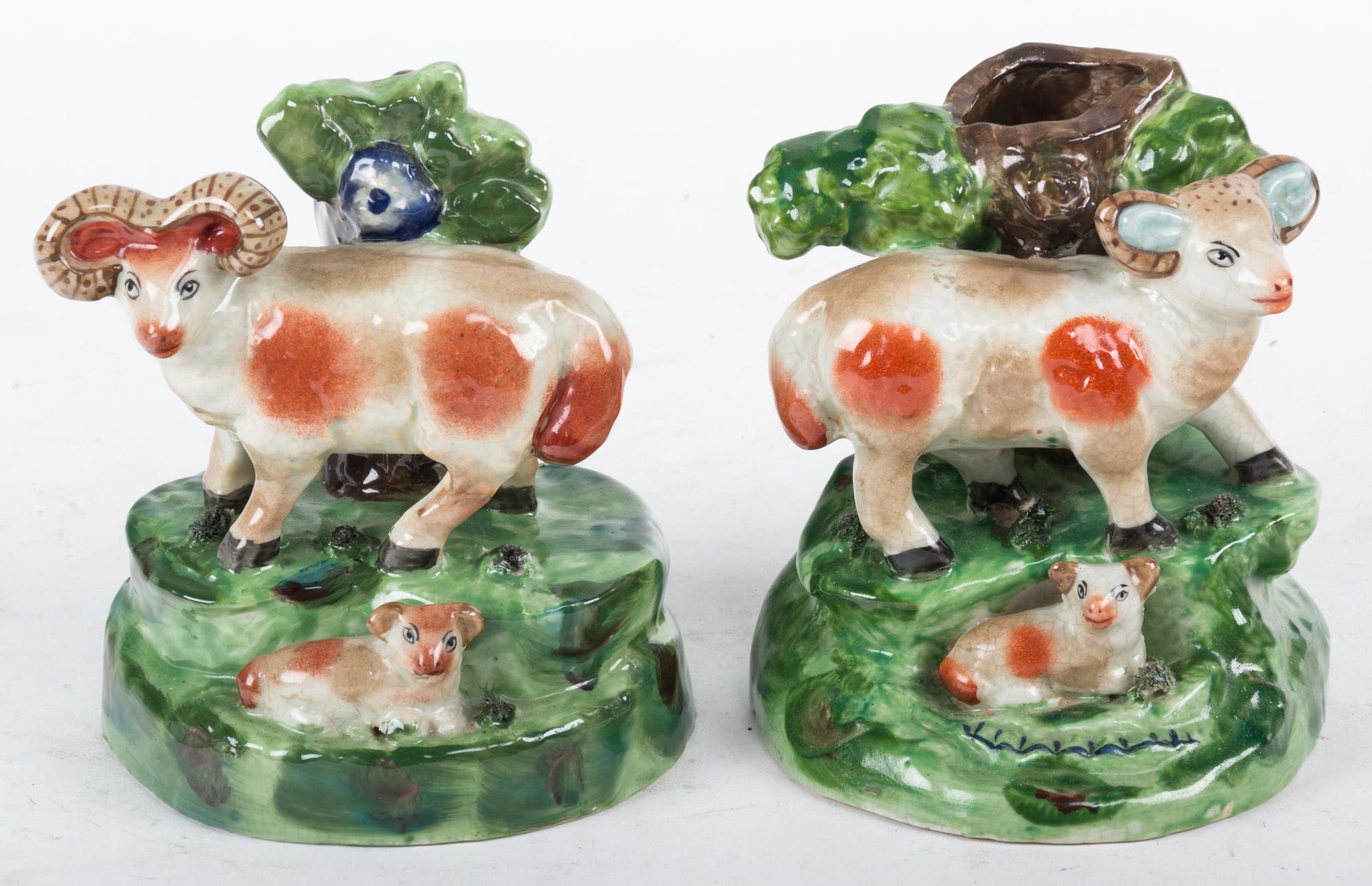 A Pair of Ceramic Figures of Sheep on Bocage Base Height 6 inches.