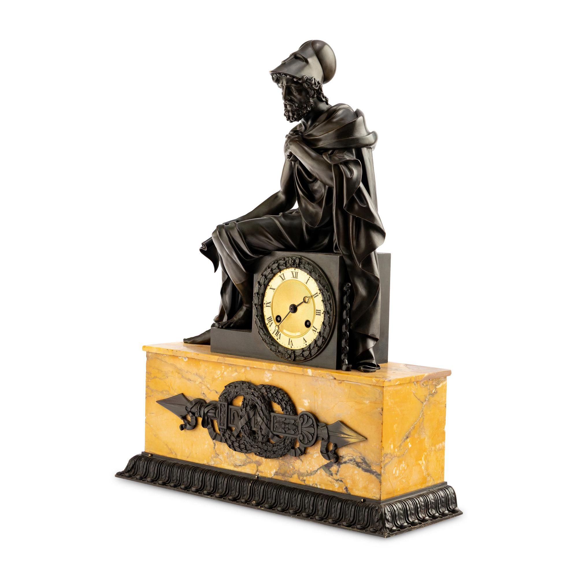 A Louis Philippe Patinated Bronze and Sienna Marble Figural Mantel Clock