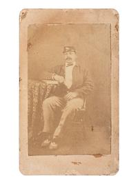 [INDIAN WARS]. CDV of a Buffalo Soldier. Fort Bridger, WY: J. Hetzel's Photograph Gallery, ca 1880s.