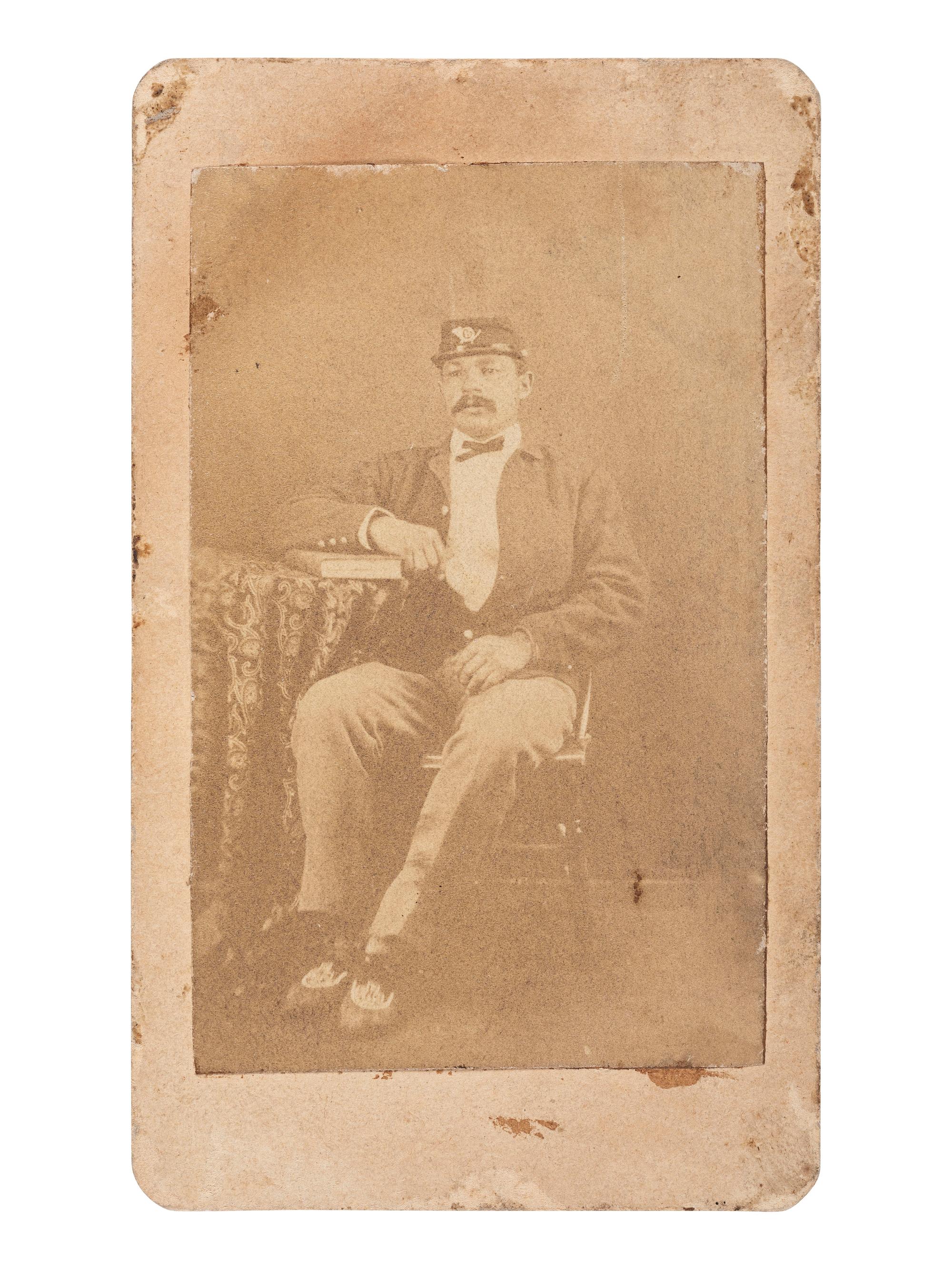 [INDIAN WARS]. CDV of a Buffalo Soldier. Fort Bridger, WY: J. Hetzel's Photograph Gallery, ca 1880s.