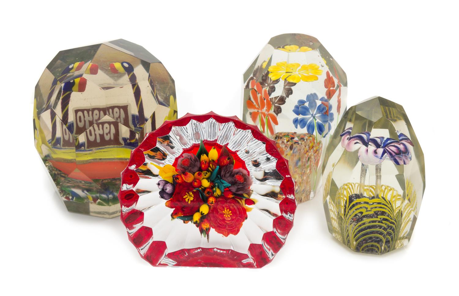A Group of Four Glass Paperweights Height of tallest 5 inches