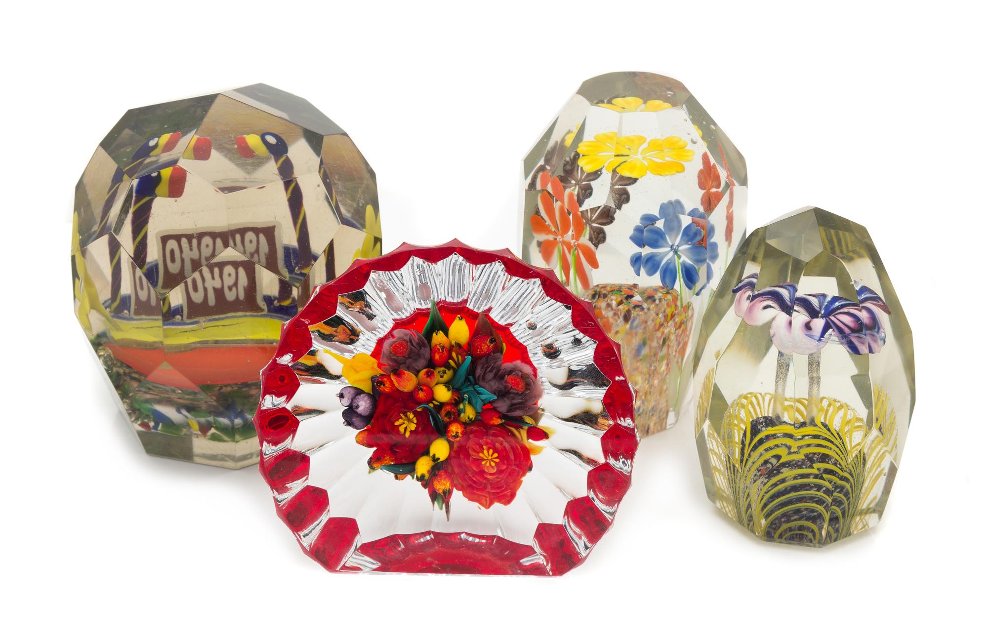 A Group of Four Glass Paperweights Height of tallest 5 inches