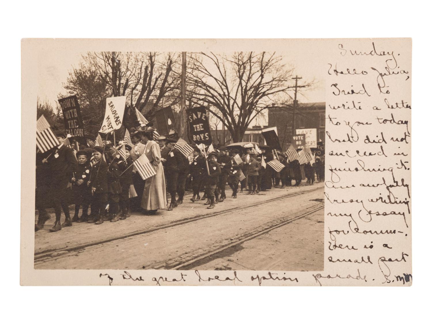 [EARLY PHOTOGRAPHY]. A group of 42 real photo postcards of cityscapes, town activities and disasters, parades, circuses, and fairs, highlighted by view of a child labor protest, an elephant parade, and bronco busting.