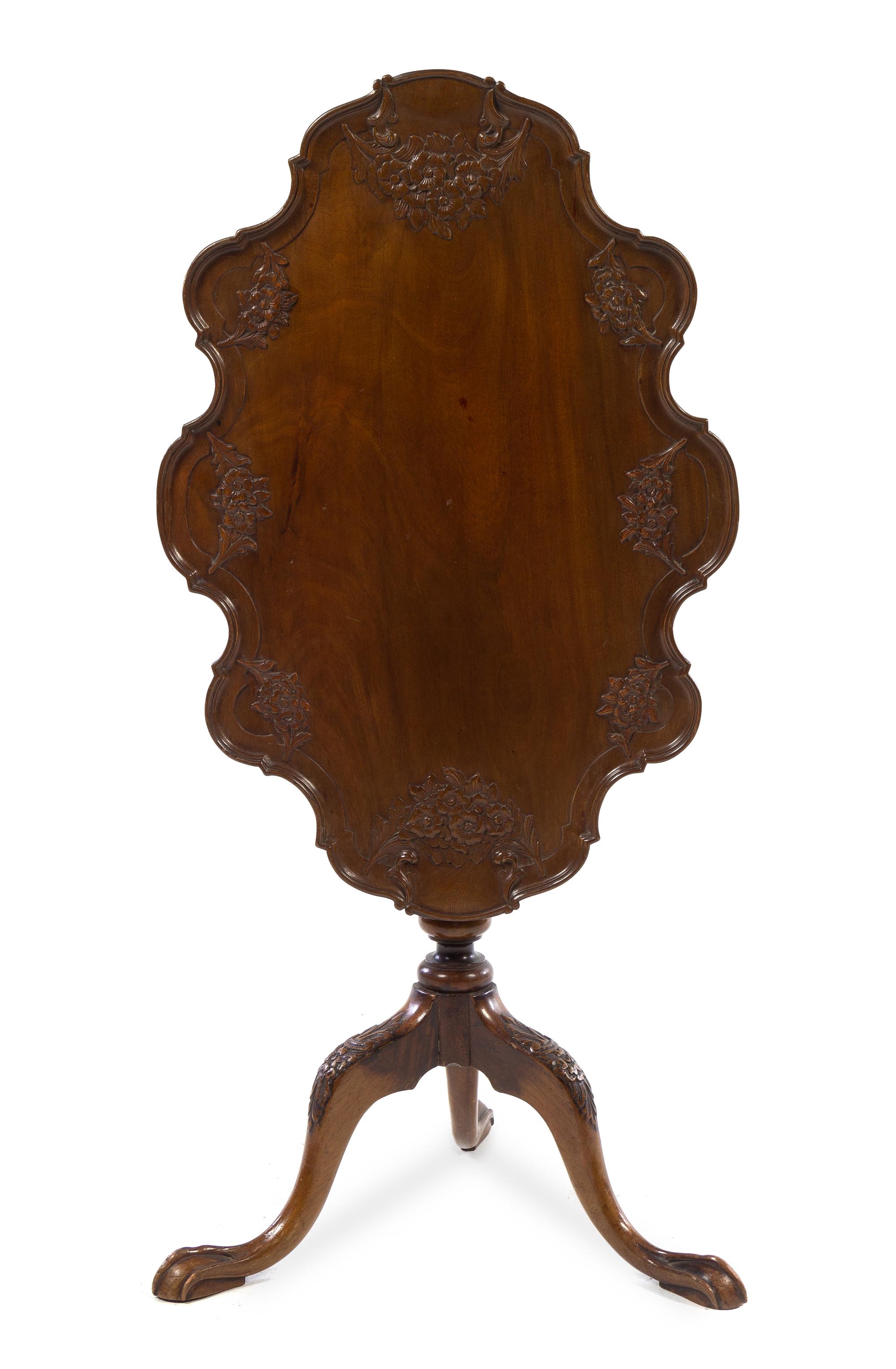 An Irish Mahogany Tilt-Top Tea Table Height 26 1/2 x width 29 1/4 x depth 20 inches. — 18TH/19TH CENTURY