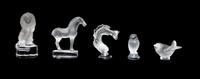 Three Lalique Molded and Frosted Glass Paperweights Height of first 3 7/8 inches.