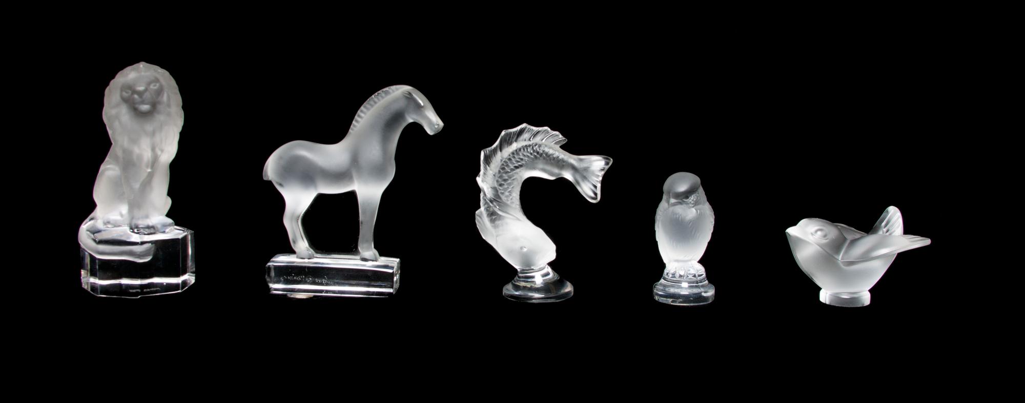 Three Lalique Molded and Frosted Glass Paperweights Height of first 3 7/8 inches.