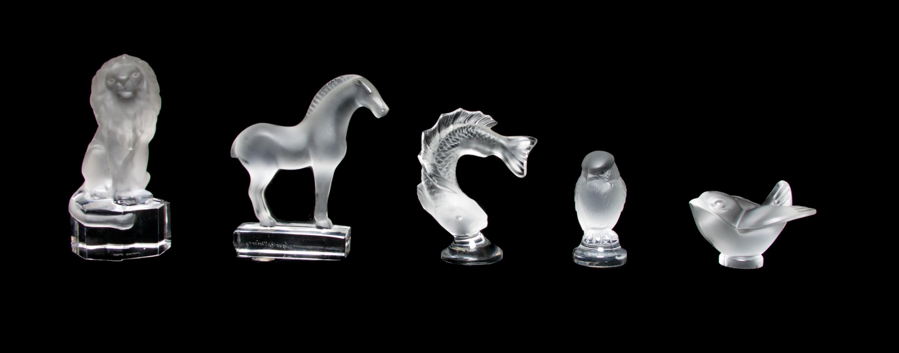 Three Lalique Molded and Frosted Glass Paperweights Height of first 3 7/8 inches.