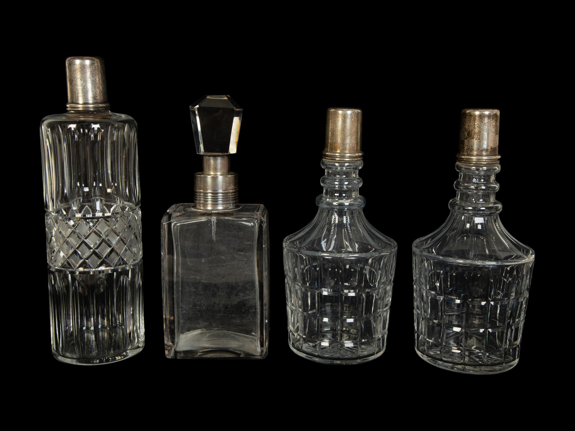 Four American Silver Mounted Cut Glass Decanters
