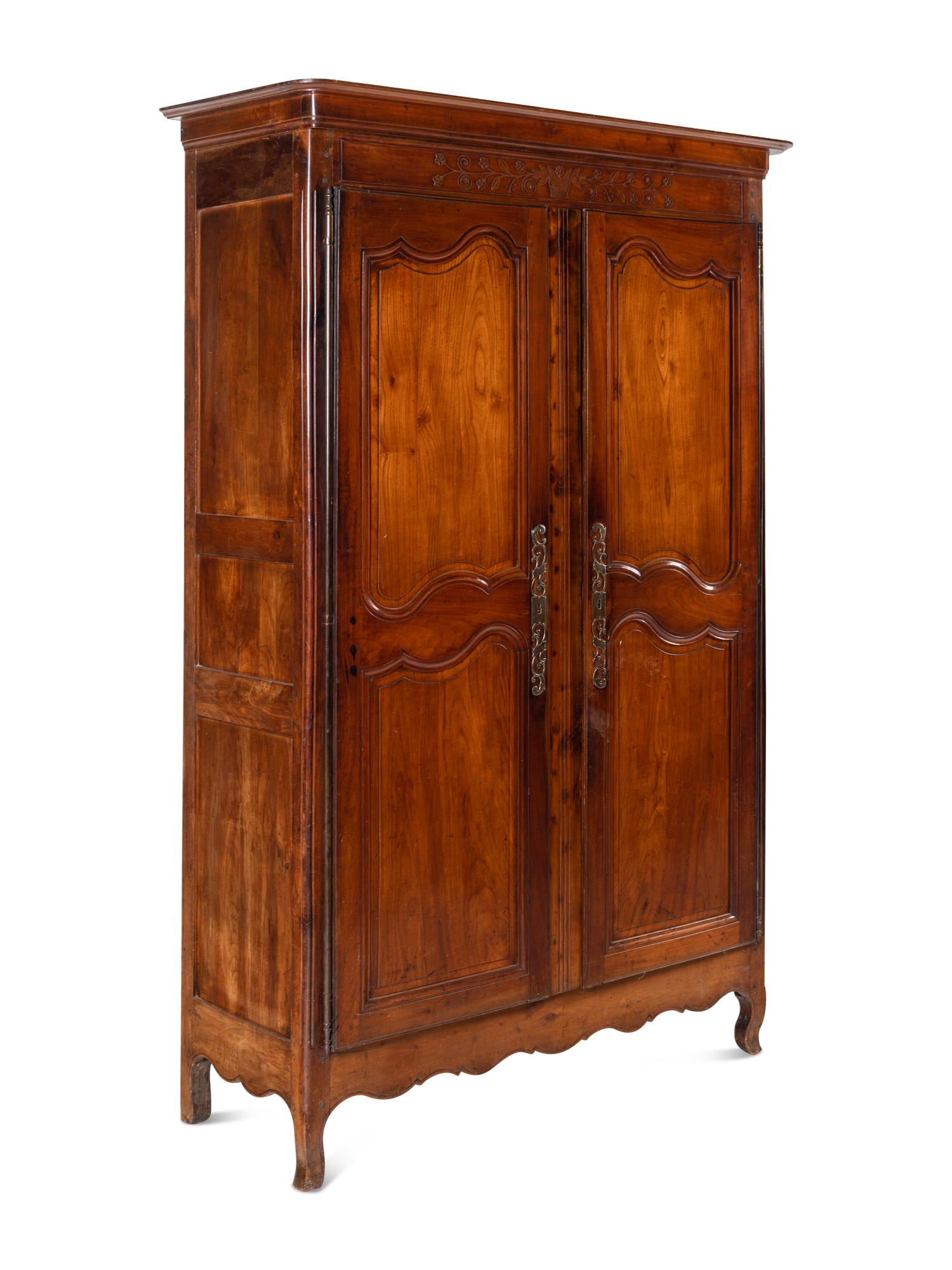 A Louis XV Provincial Walnut Armoire