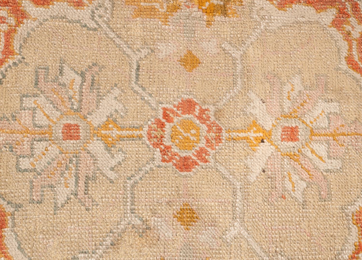 An Oushak Wool Rug