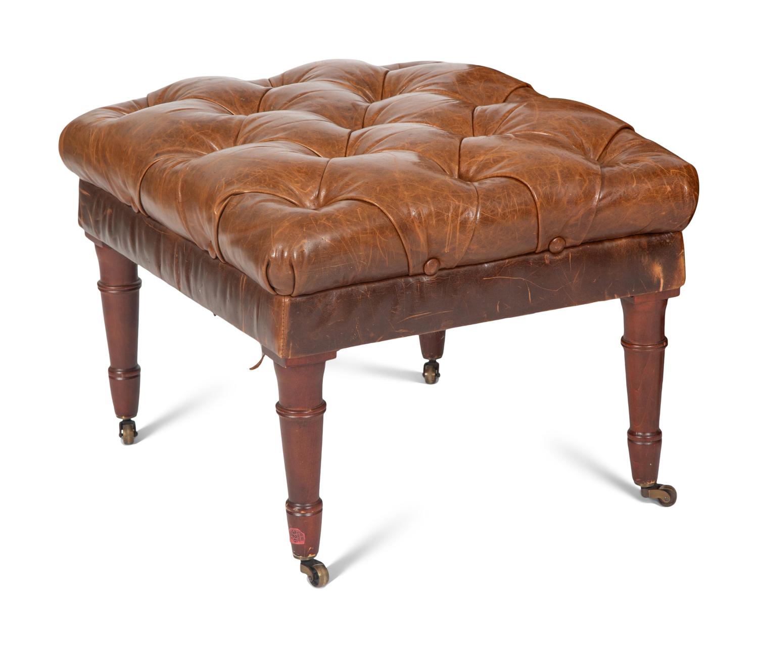 A Vanguard Furniture Leather Lounge Chair and Button Tufted Ottoman