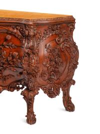 A Continental Floral-Carved and Painted Wood Commode