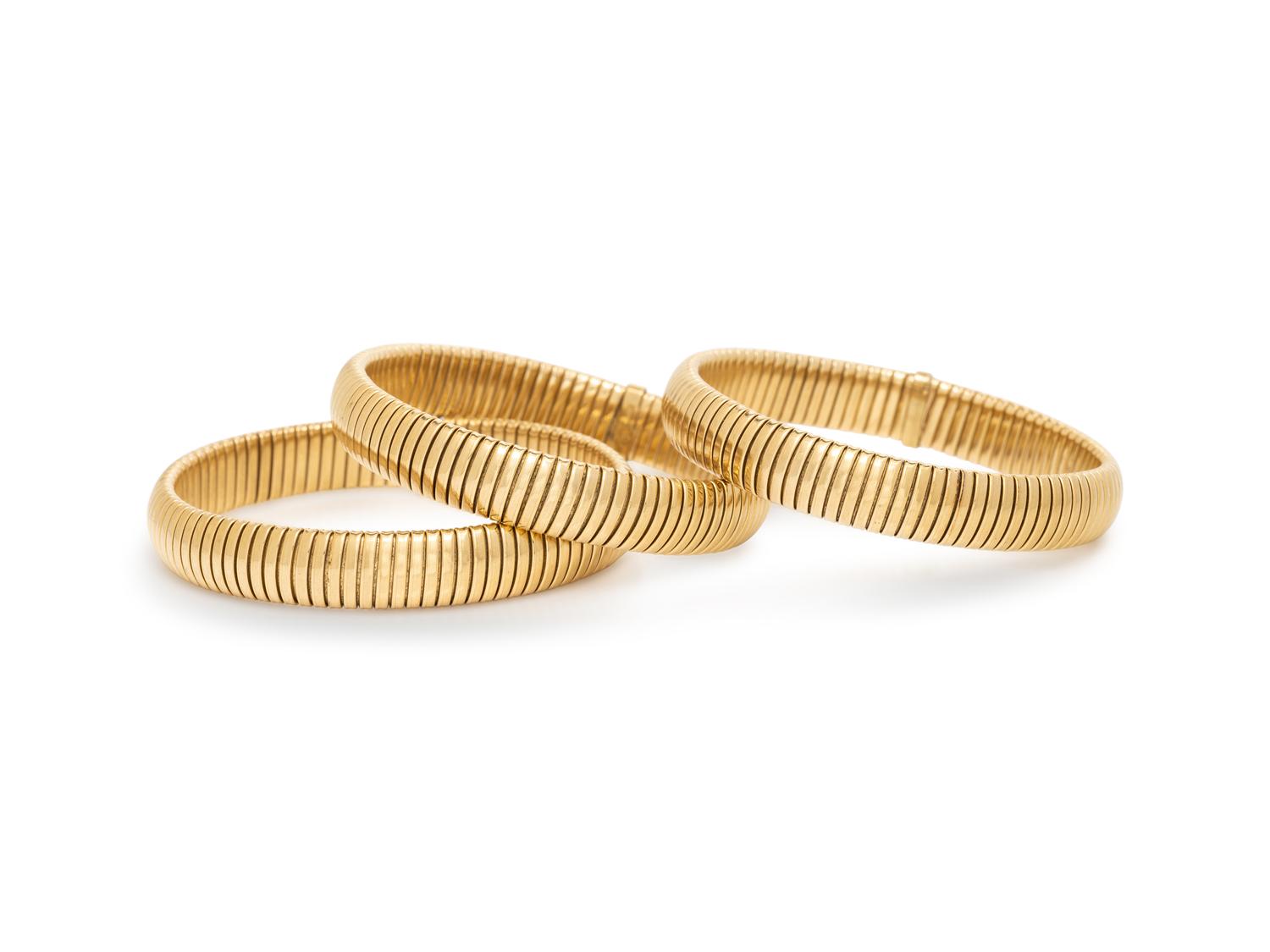 COLLECTION OF YELLOW GOLD TUBOGAS BRACELETS