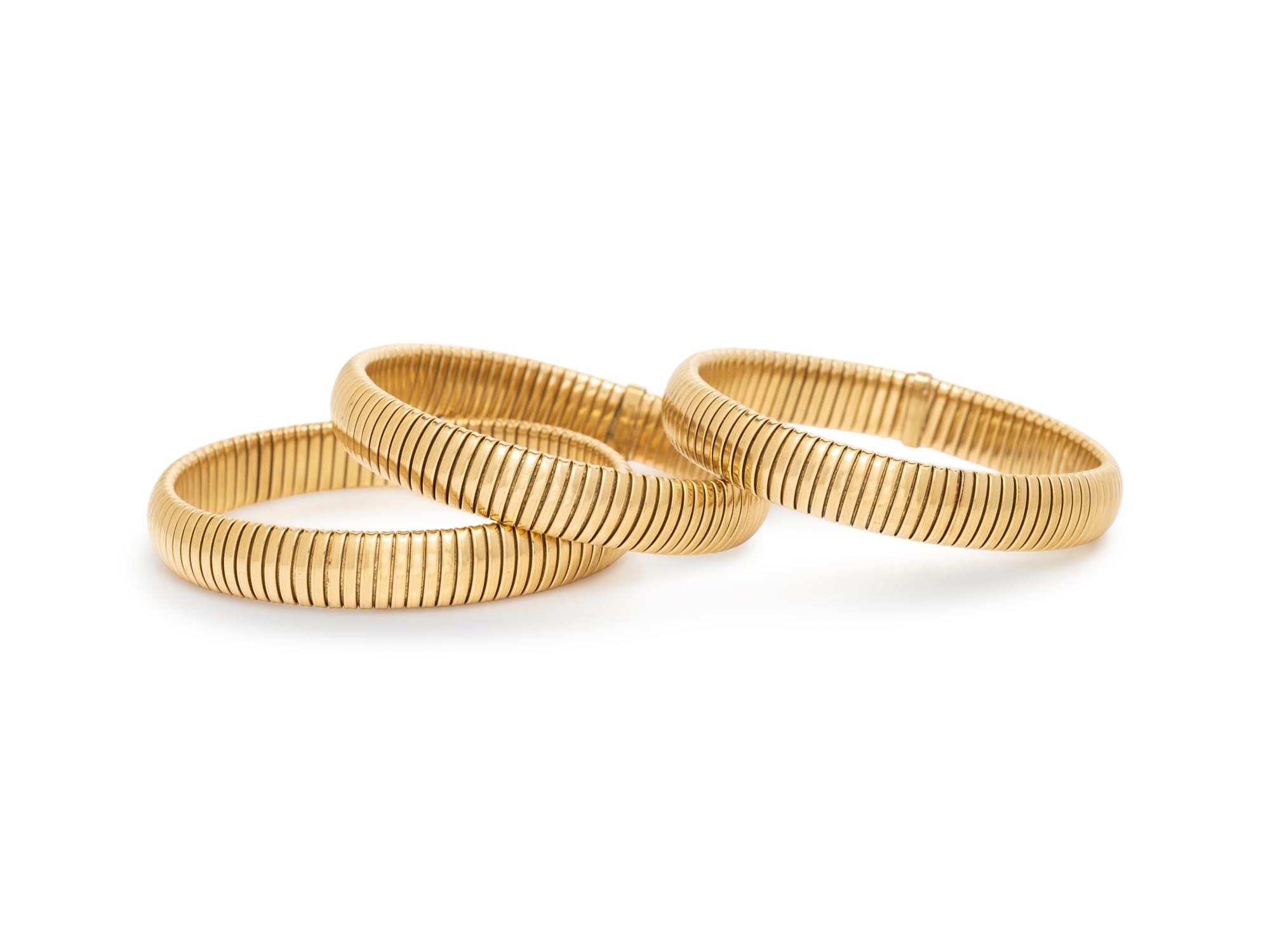 COLLECTION OF YELLOW GOLD TUBOGAS BRACELETS
