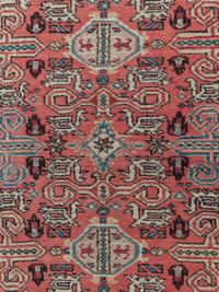 A Peperdil Wool Rug