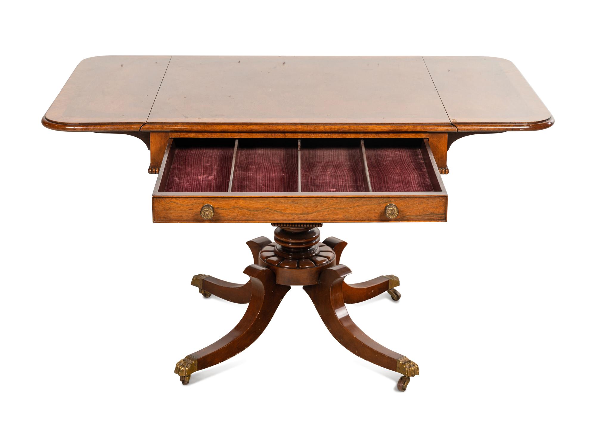 A Regency Style Mahogany Drop-Leaf Table