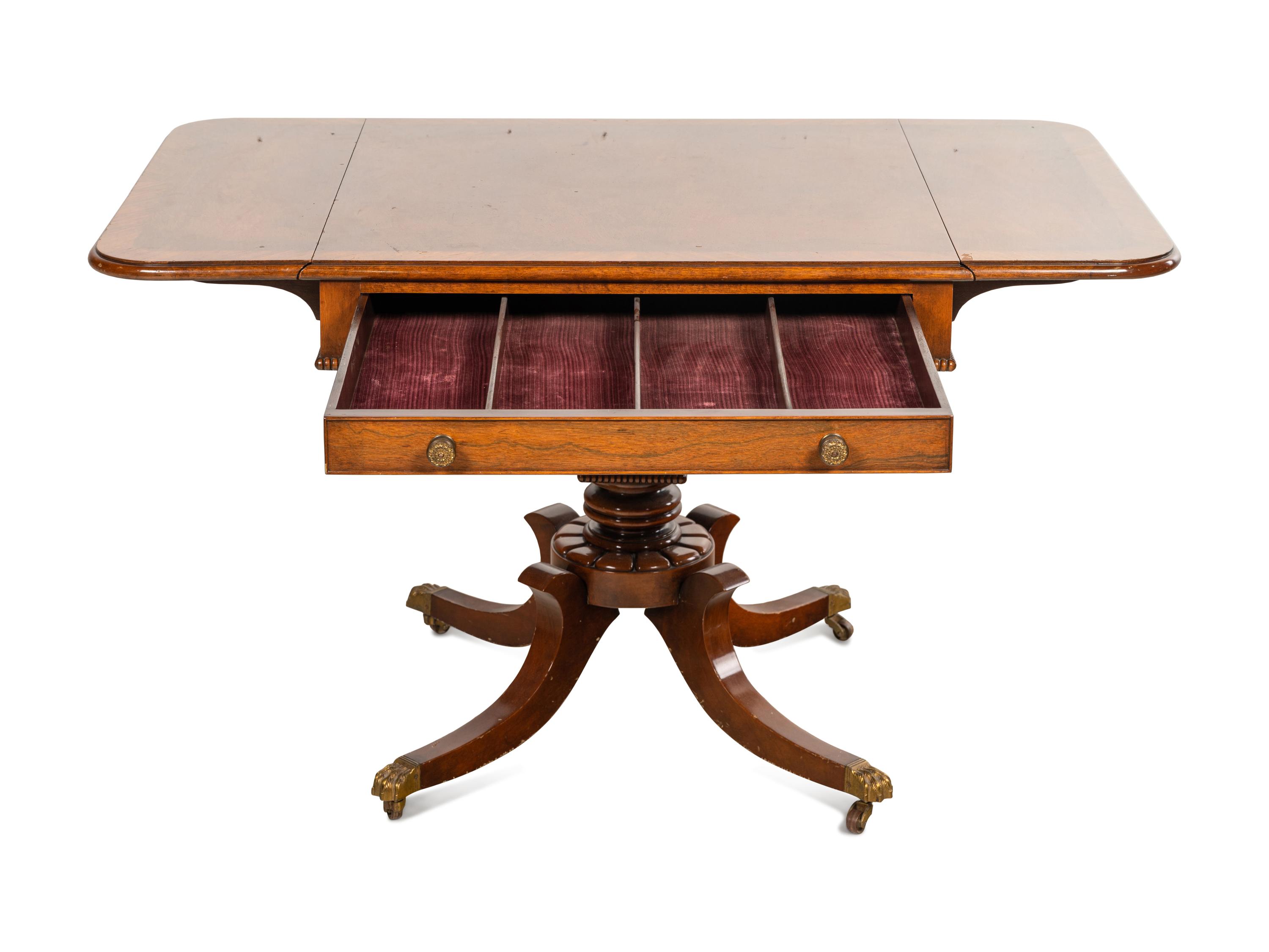 A Regency Style Mahogany Drop-Leaf Table