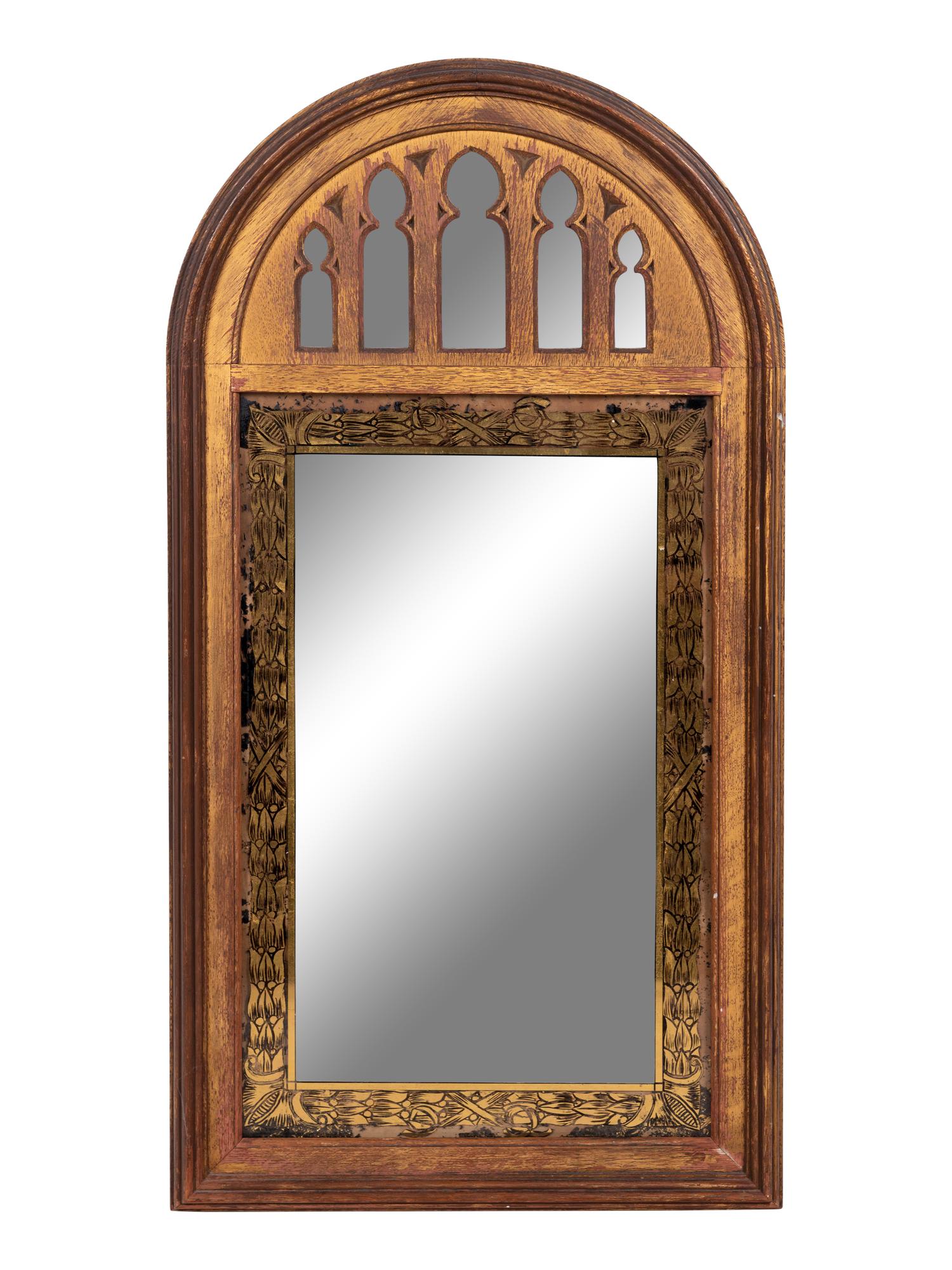 A Gothic Style Giltwood and Églomisé Mirror