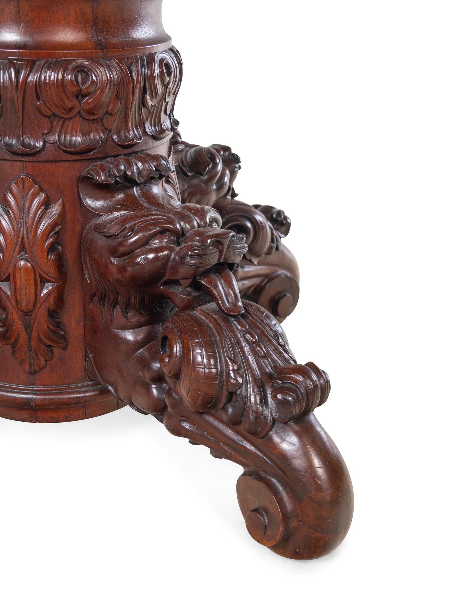 A Renaissance Revival Mask and Acanthus Carved Mahogany Pedestal Table