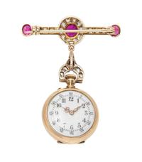 An Antique Platinum and Silver Topped Yellow Gold, Ruby and Diamond Open Face Lapel Watch, 20.40 dwts.