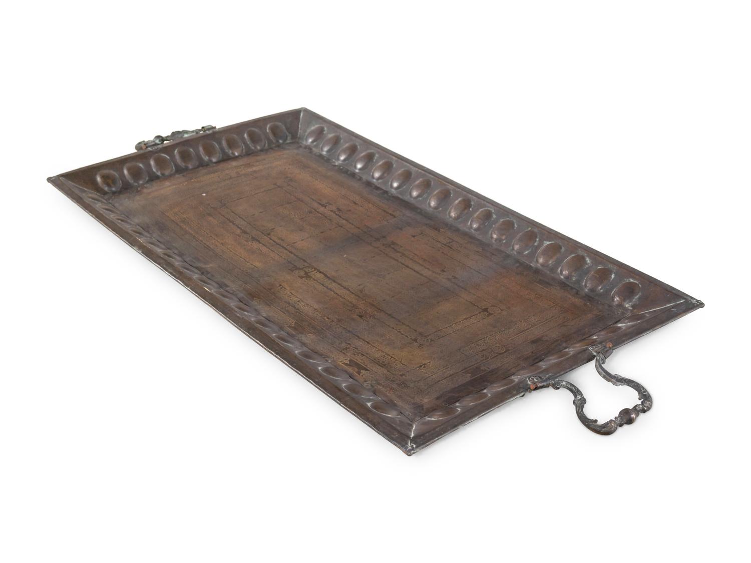 A Large Middle Eastern Damascened Brass Tray