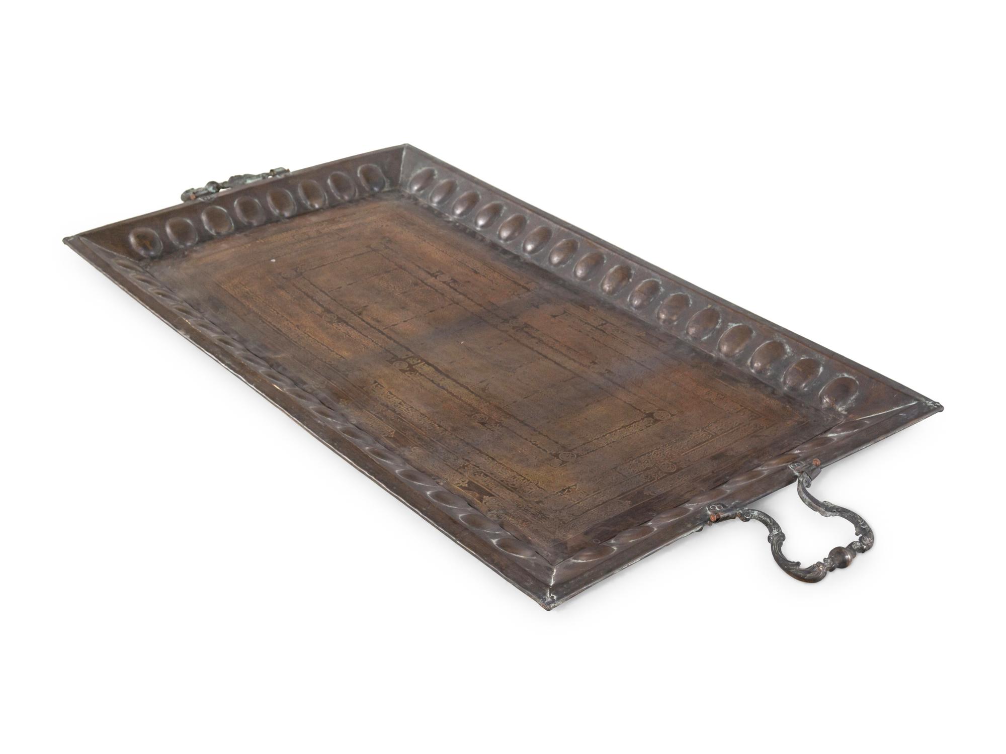 A Large Middle Eastern Damascened Brass Tray