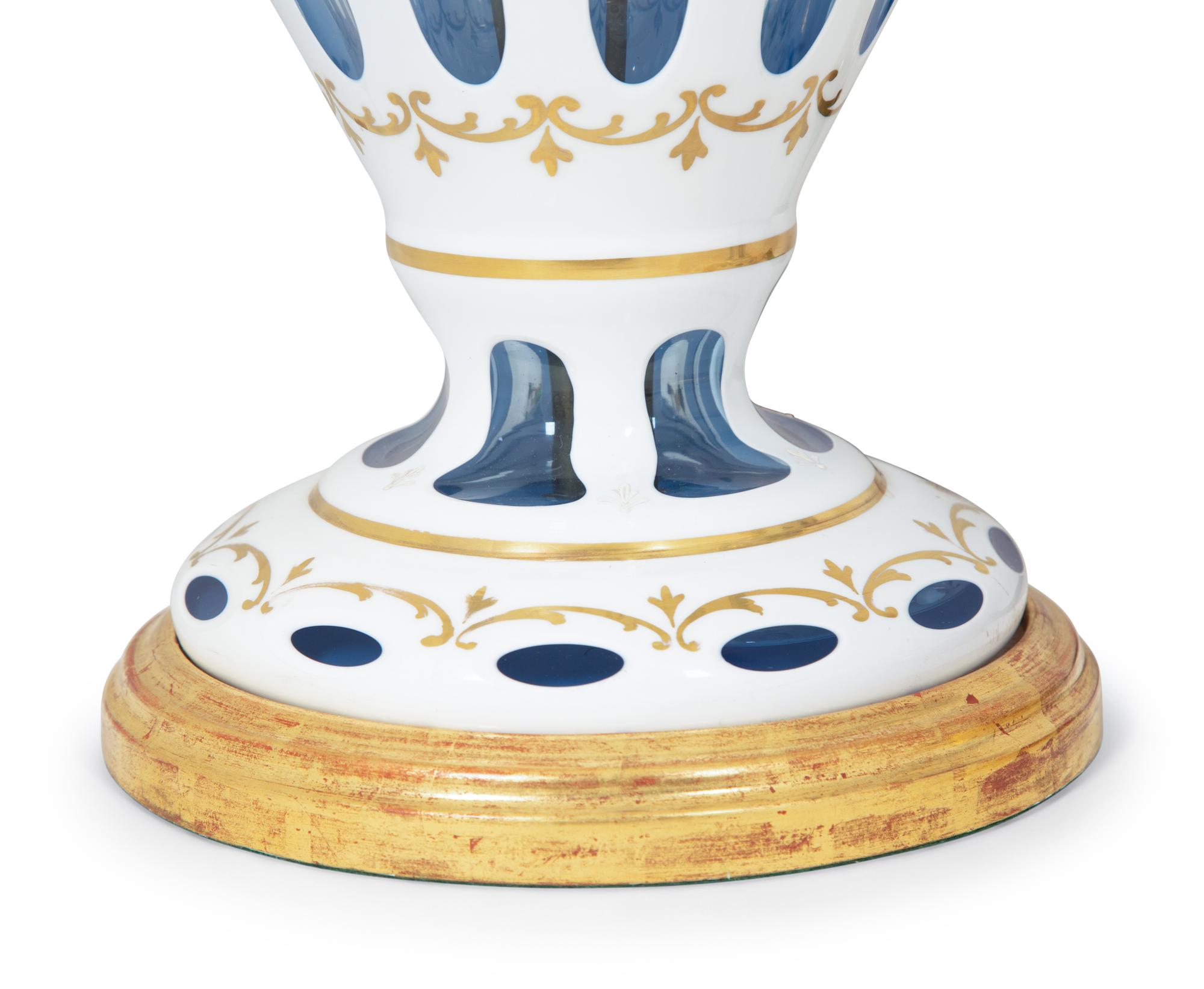 A Pair of Bohemian Enameled White Overlay Glass Baluster Vases
