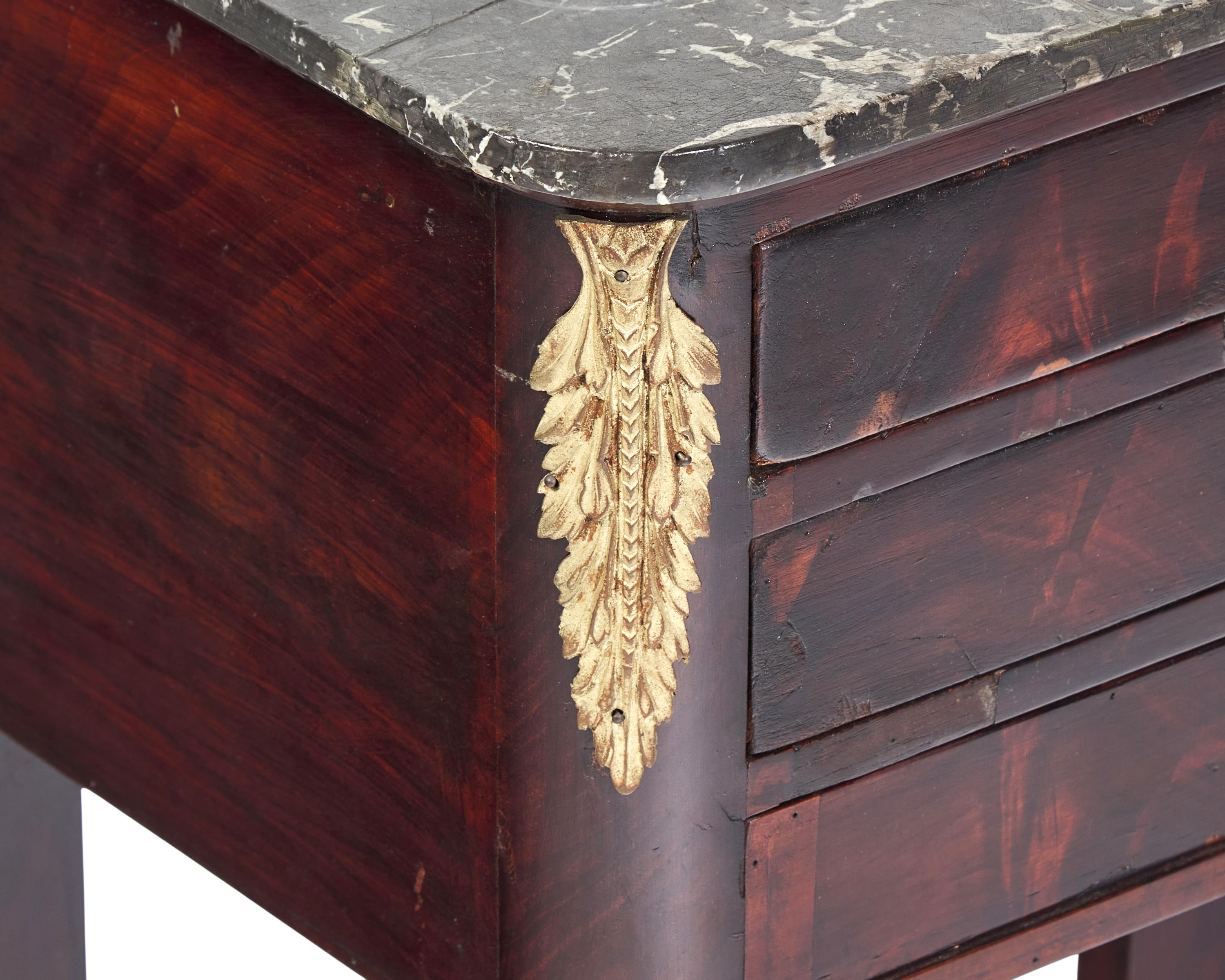 A French Louis Philippe Gilt Bronze-Mounted Mahogany Dressing Table With Marble Top