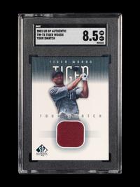 A 2001 Upper Deck SP Authentic Tiger Woods Tour Swatch TW-TS Rookie Golf Card (SGC 8.5 NM-MT+)