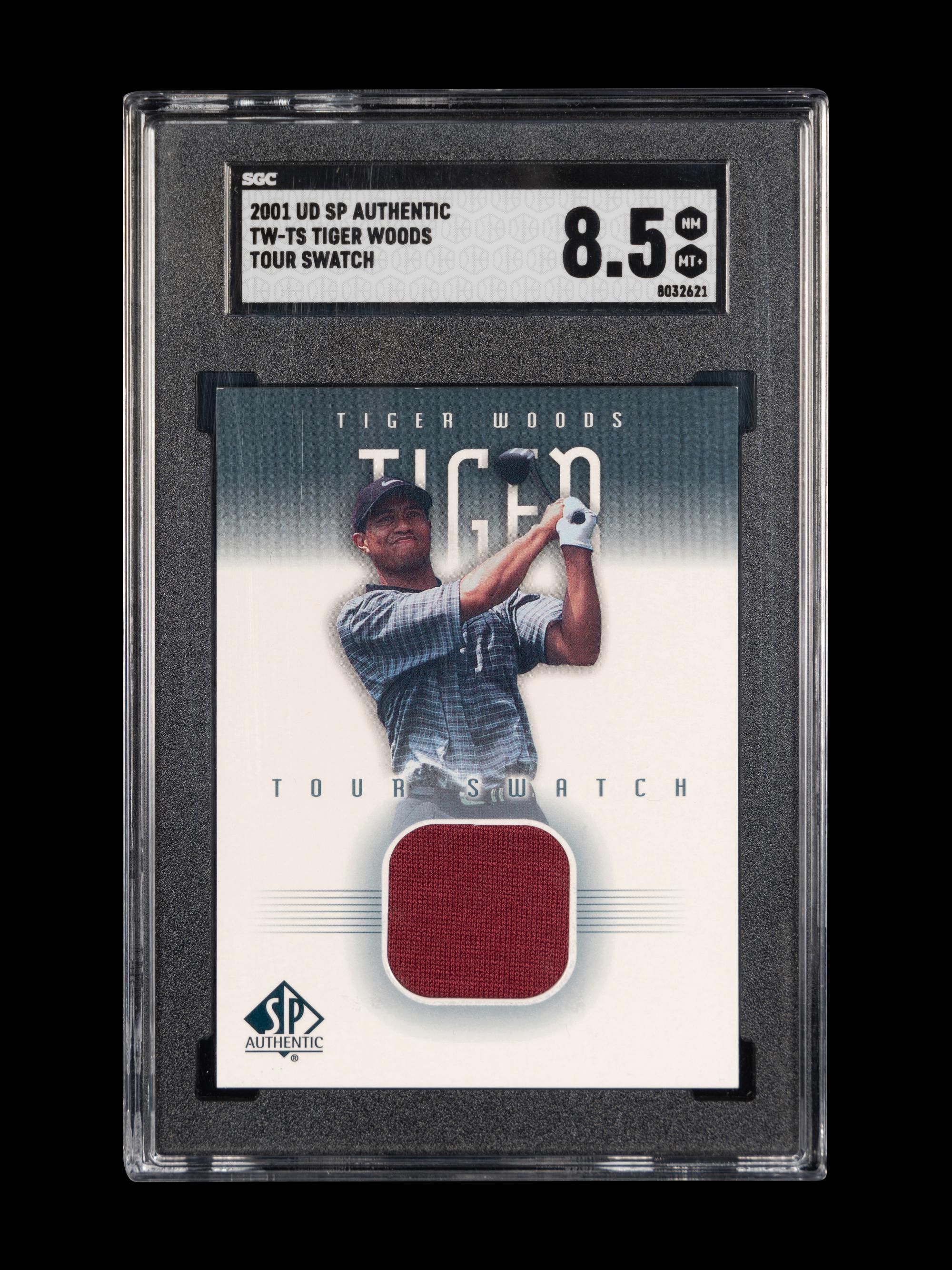 A 2001 Upper Deck SP Authentic Tiger Woods Tour Swatch TW-TS Rookie Golf Card (SGC 8.5 NM-MT+)
