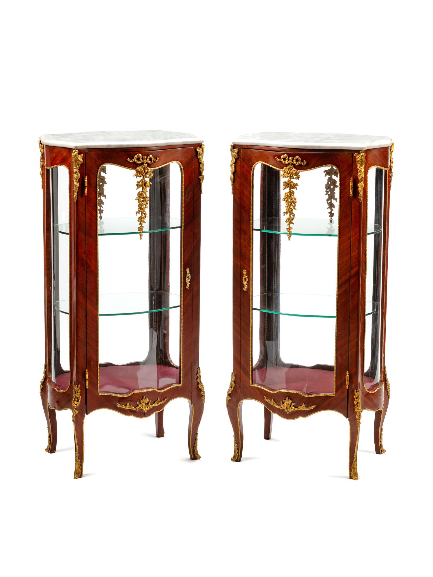 A Pair of Louis XV Style Gilt Bronze Mounted Marble-Top Vitrine Cabinets