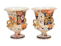A Near Pair of Derby Porcelain Campagna Urns