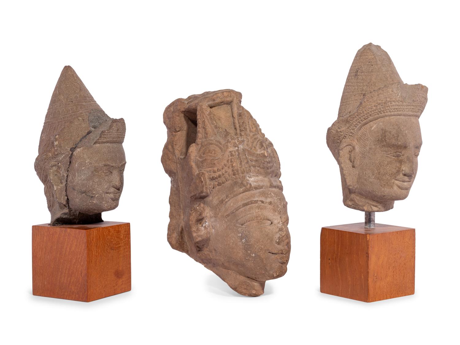 Three Carved Stone Heads of Buddha