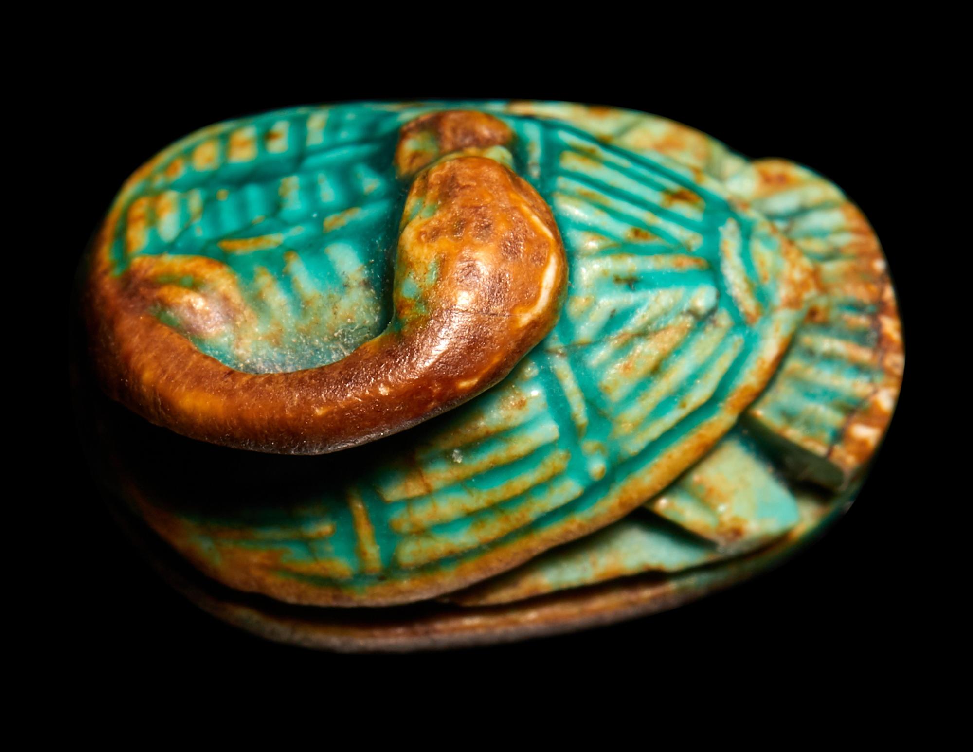 An Egyptian Faience Duck Scaraboid