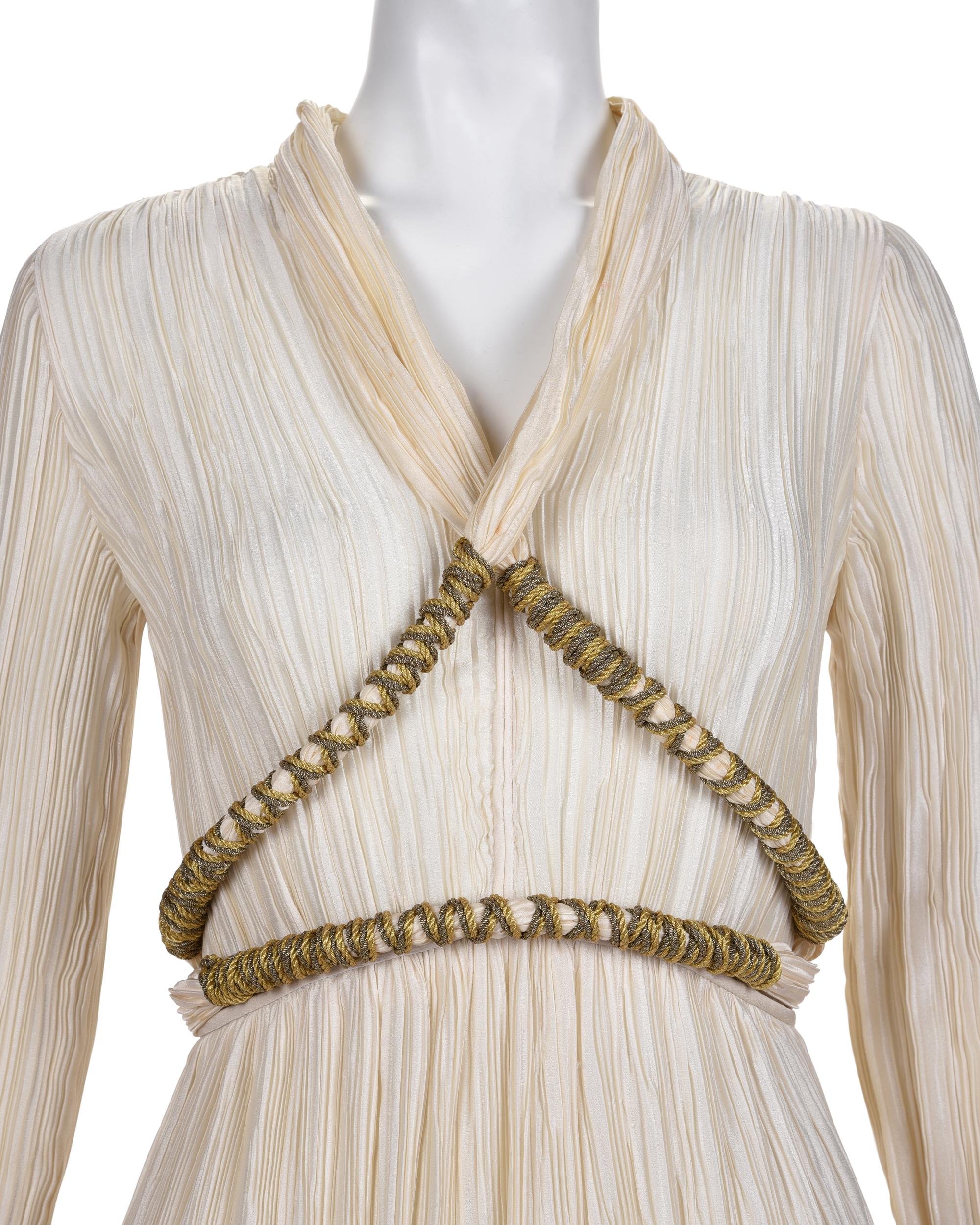 Three Pleated Items: One Zandra Rhodes Bolero and Dress, and One Mary McFadden Dress with Belt, 1980s