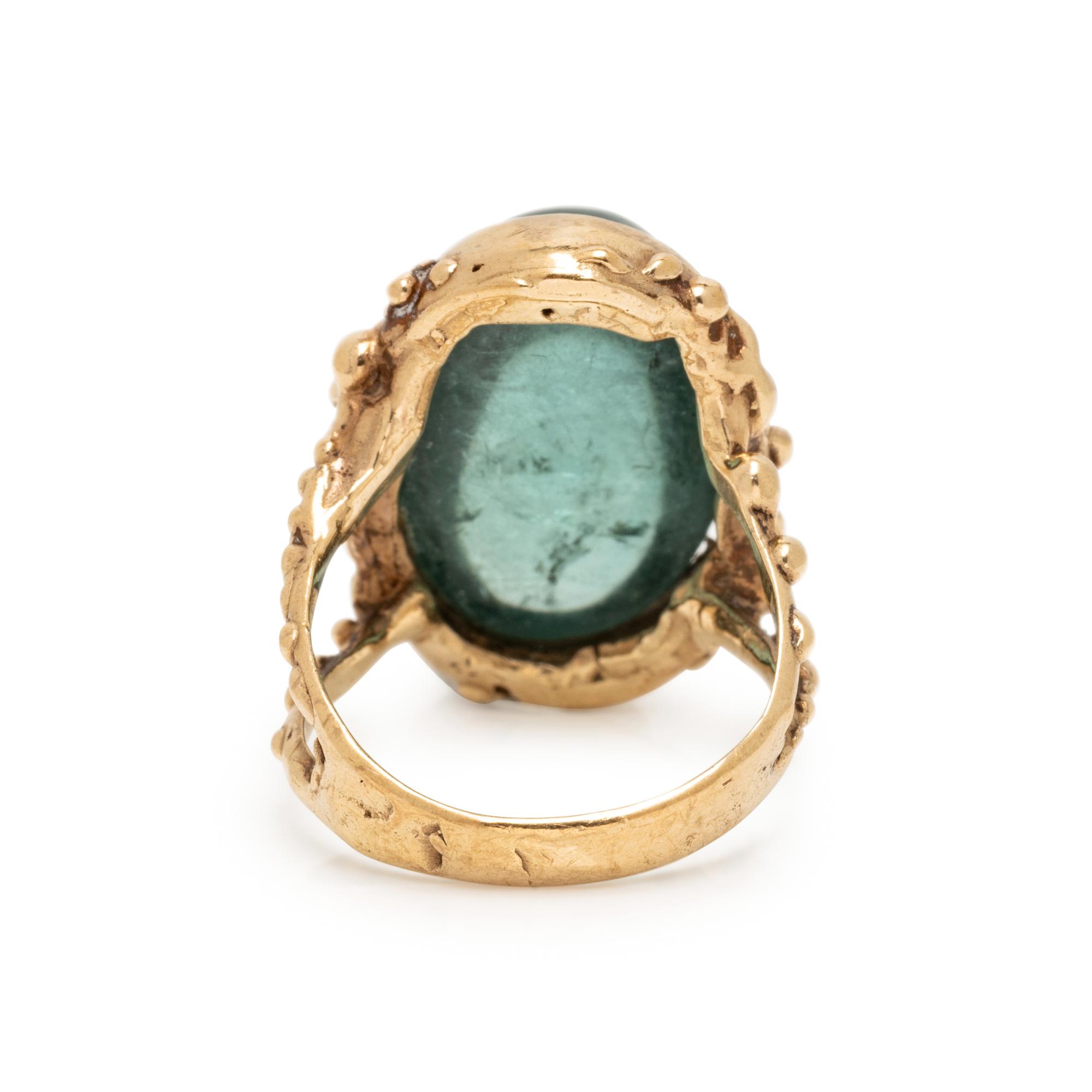 YELLOW GOLD AND GREEN TOURMALINE RING