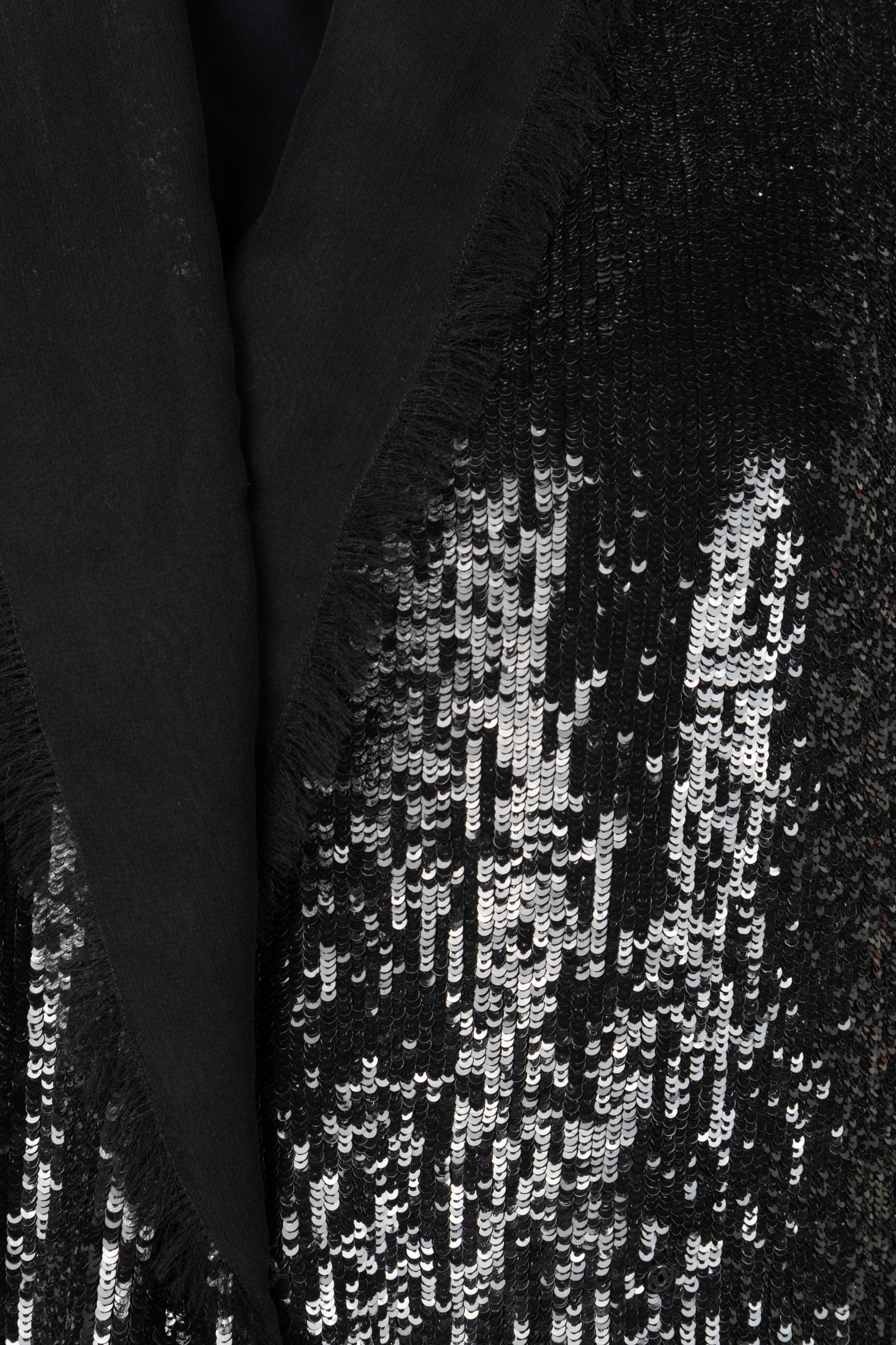 Four Sleeveless Tops and Two Sequined Pants: One Akris, One Giorgio Armani, One Unlabeled and Three Ralph Rucci