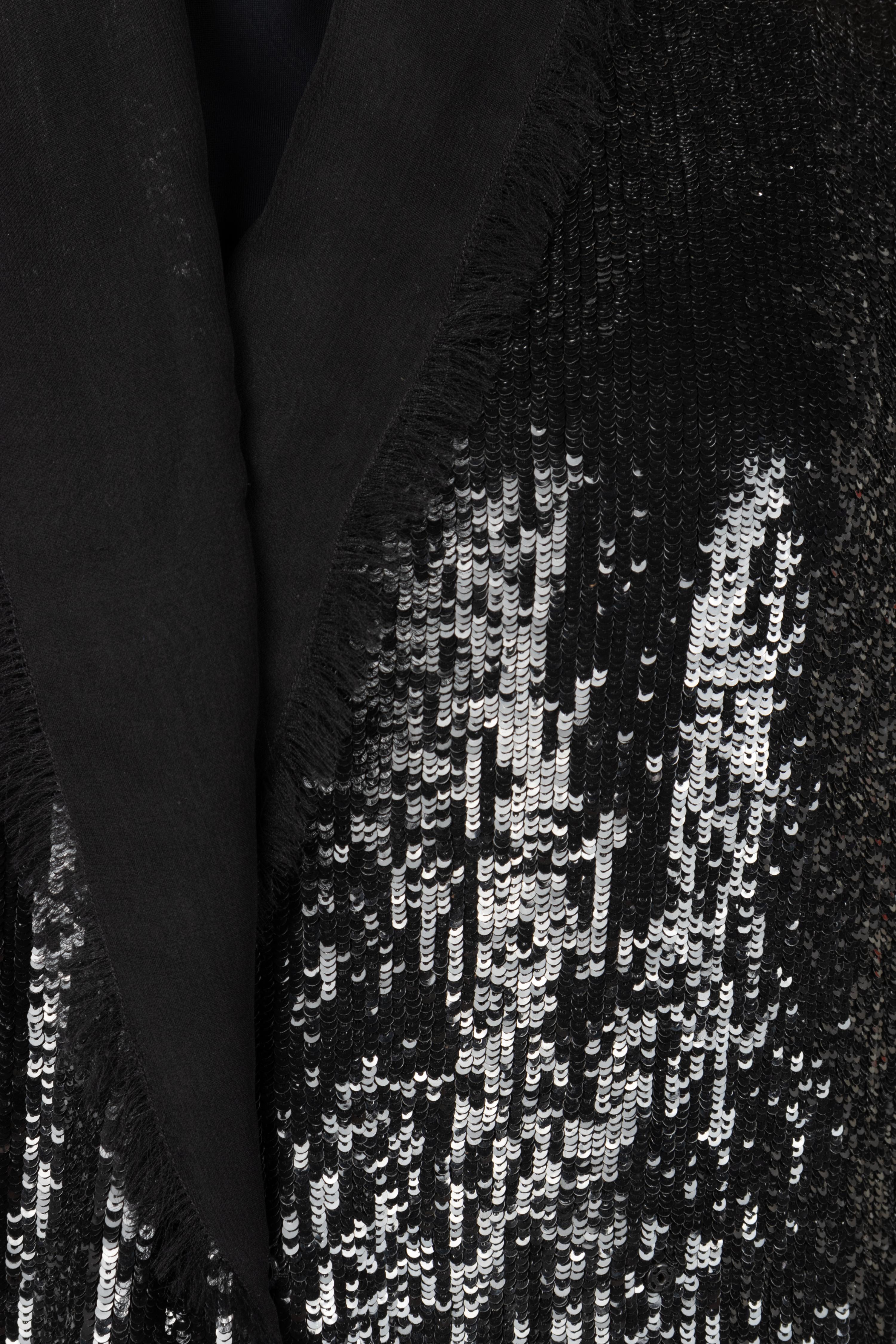 Four Sleeveless Tops and Two Sequined Pants: One Akris, One Giorgio Armani, One Unlabeled and Three Ralph Rucci