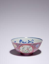 A Ruby Sgraffito Ground Famille Rose and Underglaze Blue Porcelain Bowl