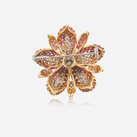 An 18K Yellow Gold, Diamond, and Ruby Brooch