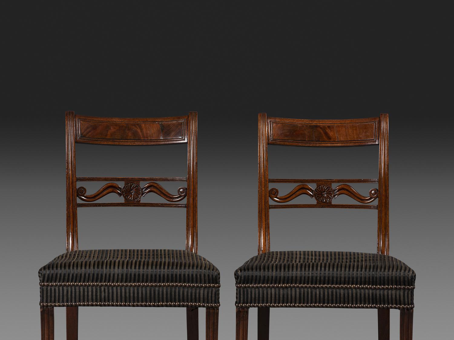 A Pair of Classical Carved and Figured Mahogany Klismos Side Chair