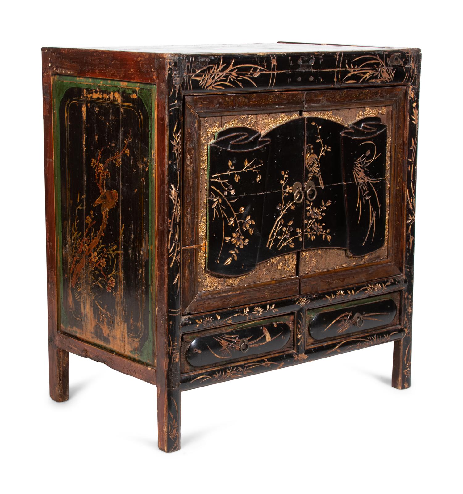 A Chinese Export Cabinet with Carved Lacquer Decoration
