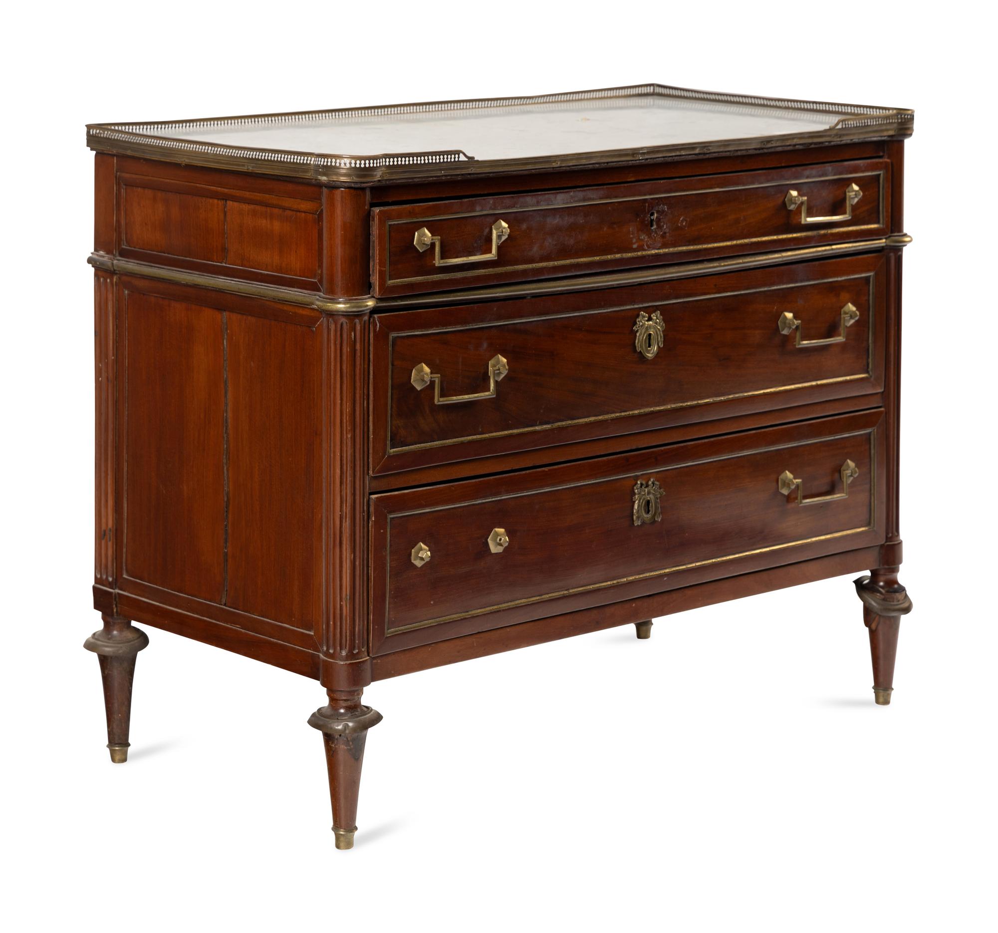 A Directoire Gilt Bronze Mounted Mahogany and Marble-Top Commode