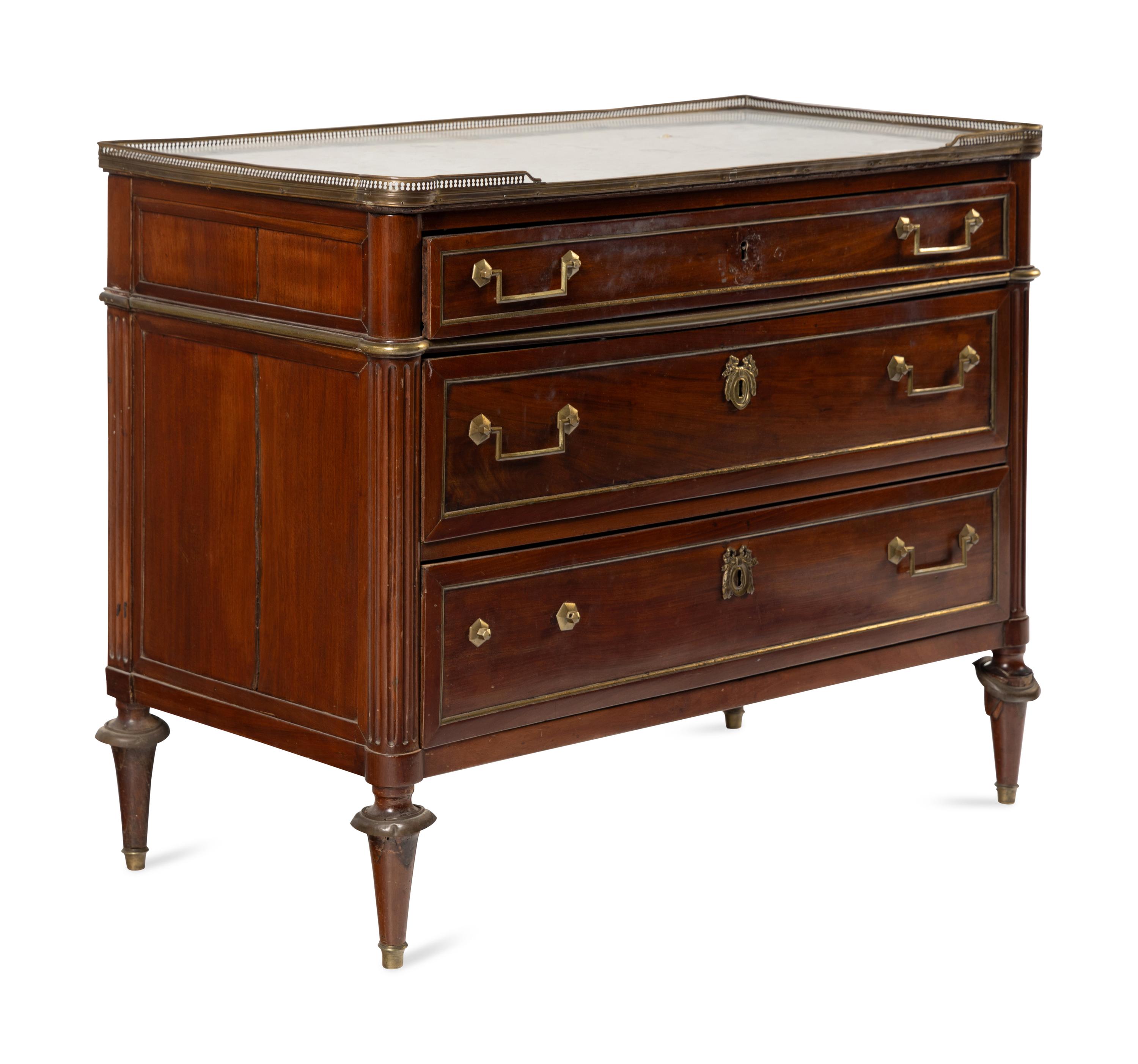 A Directoire Gilt Bronze Mounted Mahogany and Marble-Top Commode
