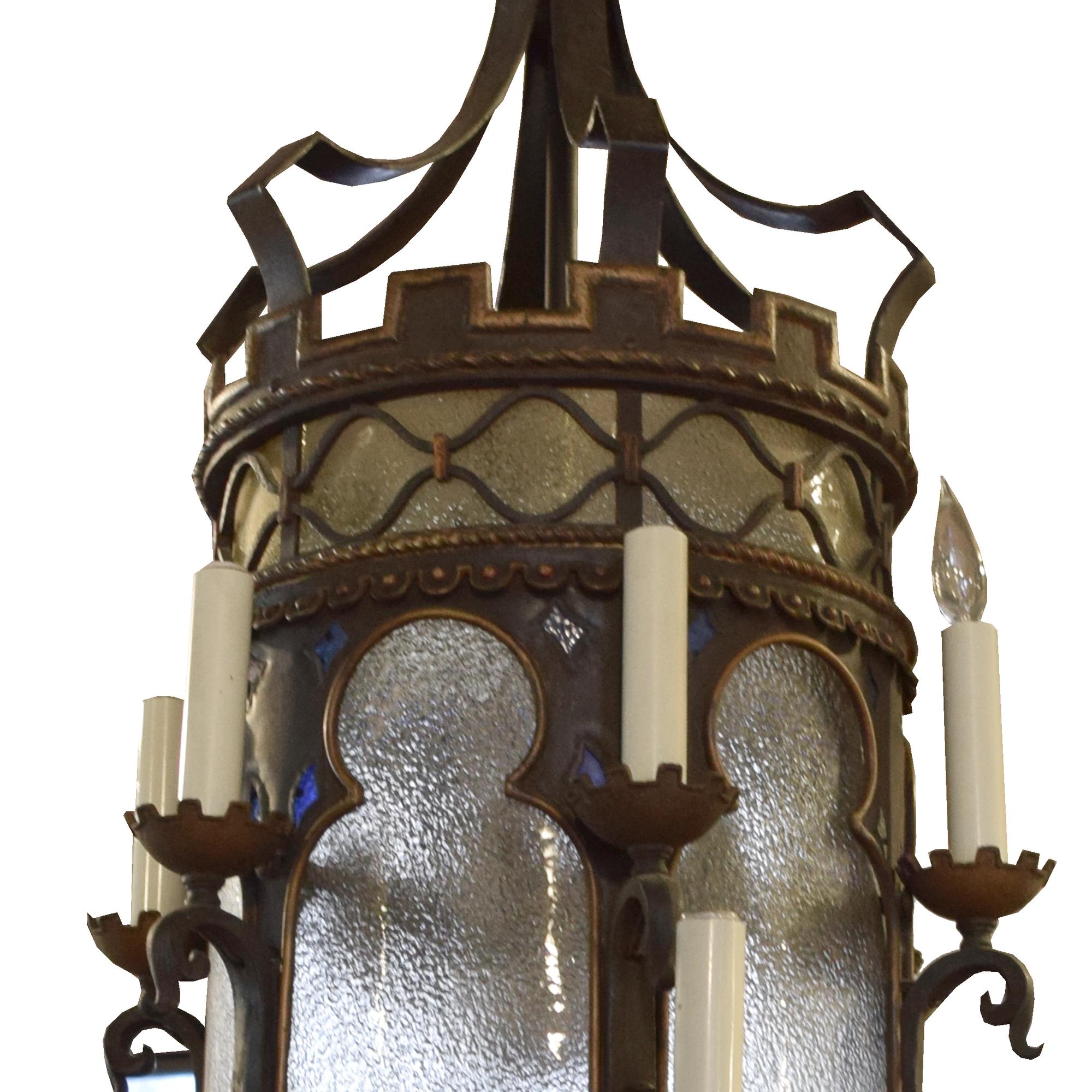 A Bronze and Iron Chandelier from a Chicago Theatre 28" W x 28" D x 75" H — United States, 20th Century