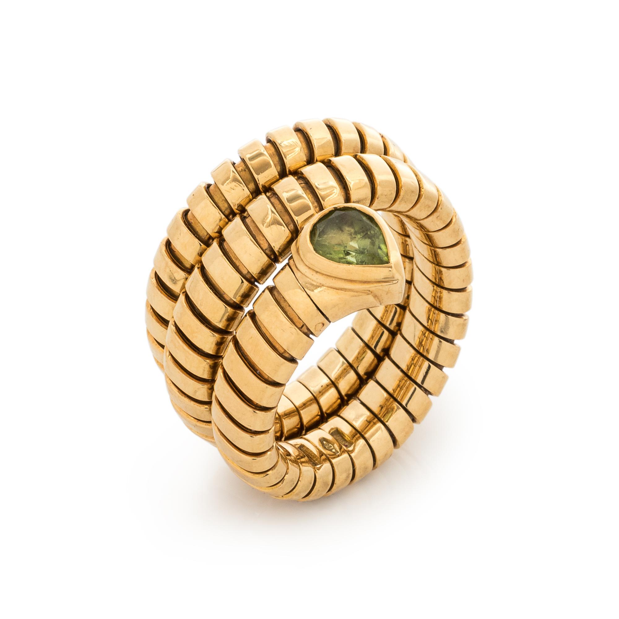 BVLGARI, YELLOW GOLD AND PERIDOT 'SERPENTI' RING