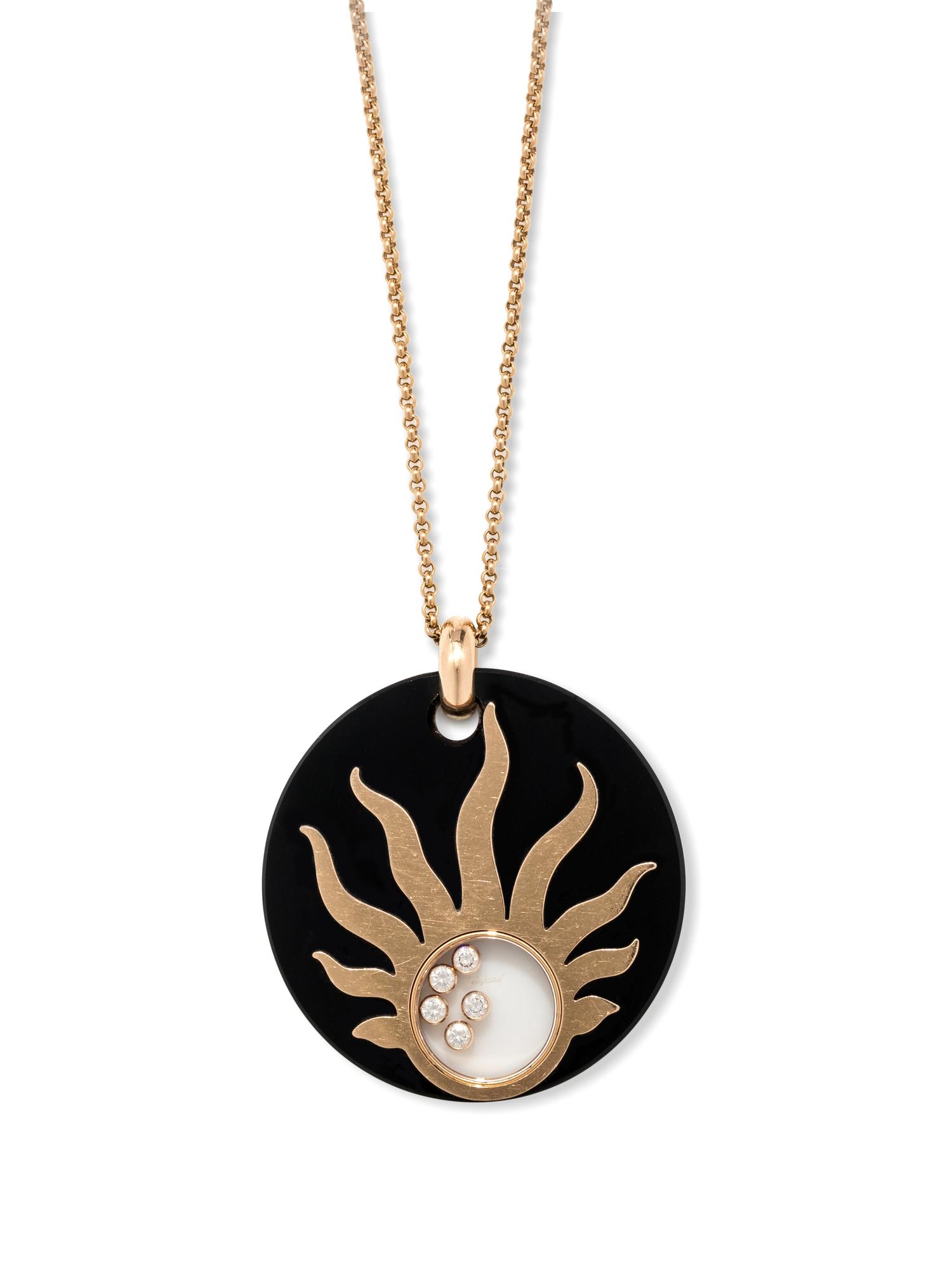 CHOPARD, ONYX AND DIAMOND 'HAPPY SUN' PENDANT/NECKLACE