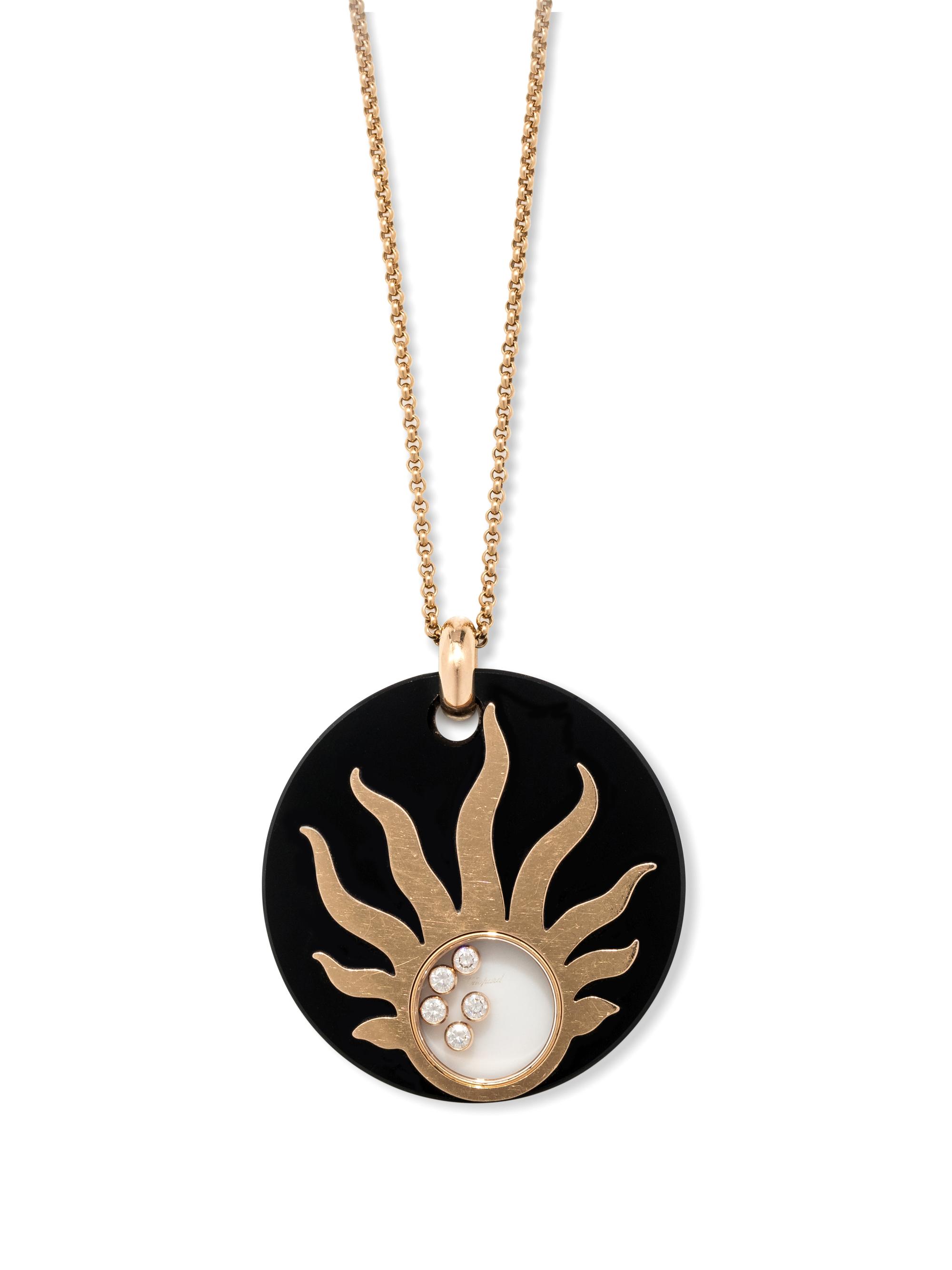 CHOPARD, ONYX AND DIAMOND 'HAPPY SUN' PENDANT/NECKLACE