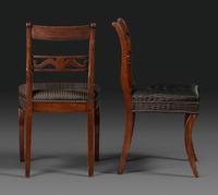 A Pair of Classical Carved and Figured Mahogany Klismos Side Chair