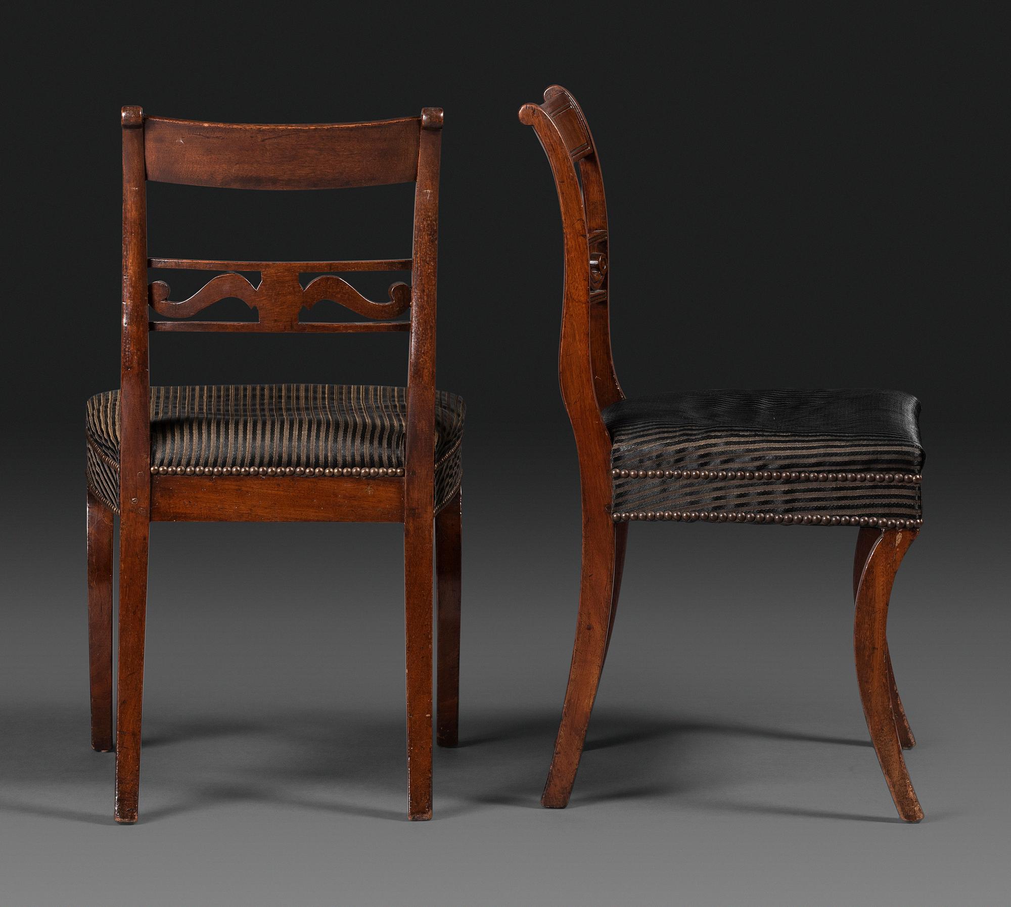 A Pair of Classical Carved and Figured Mahogany Klismos Side Chair